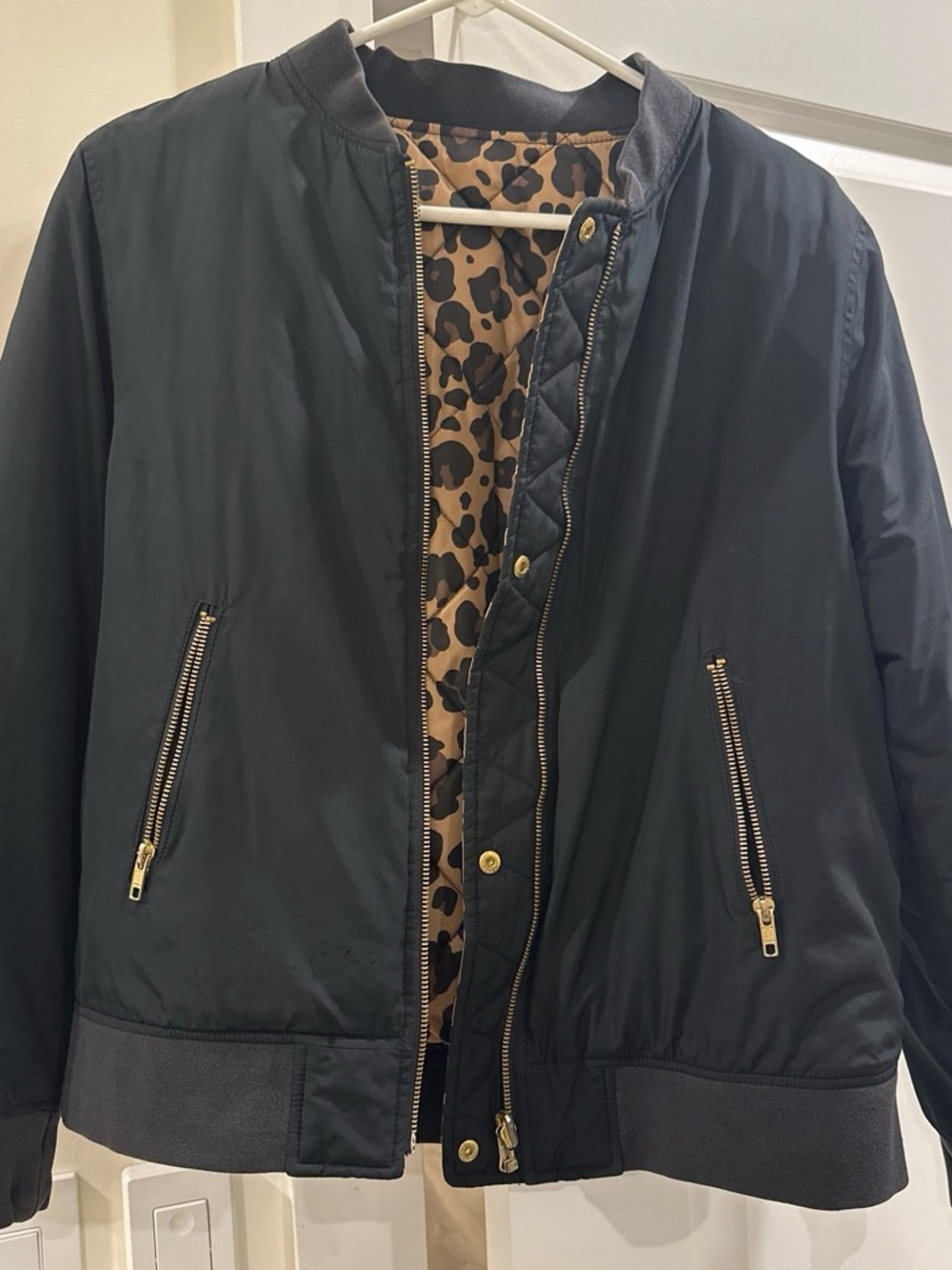 Women’s Reversible Black & Leopard Bomber Jacket with gold zippers and pockets